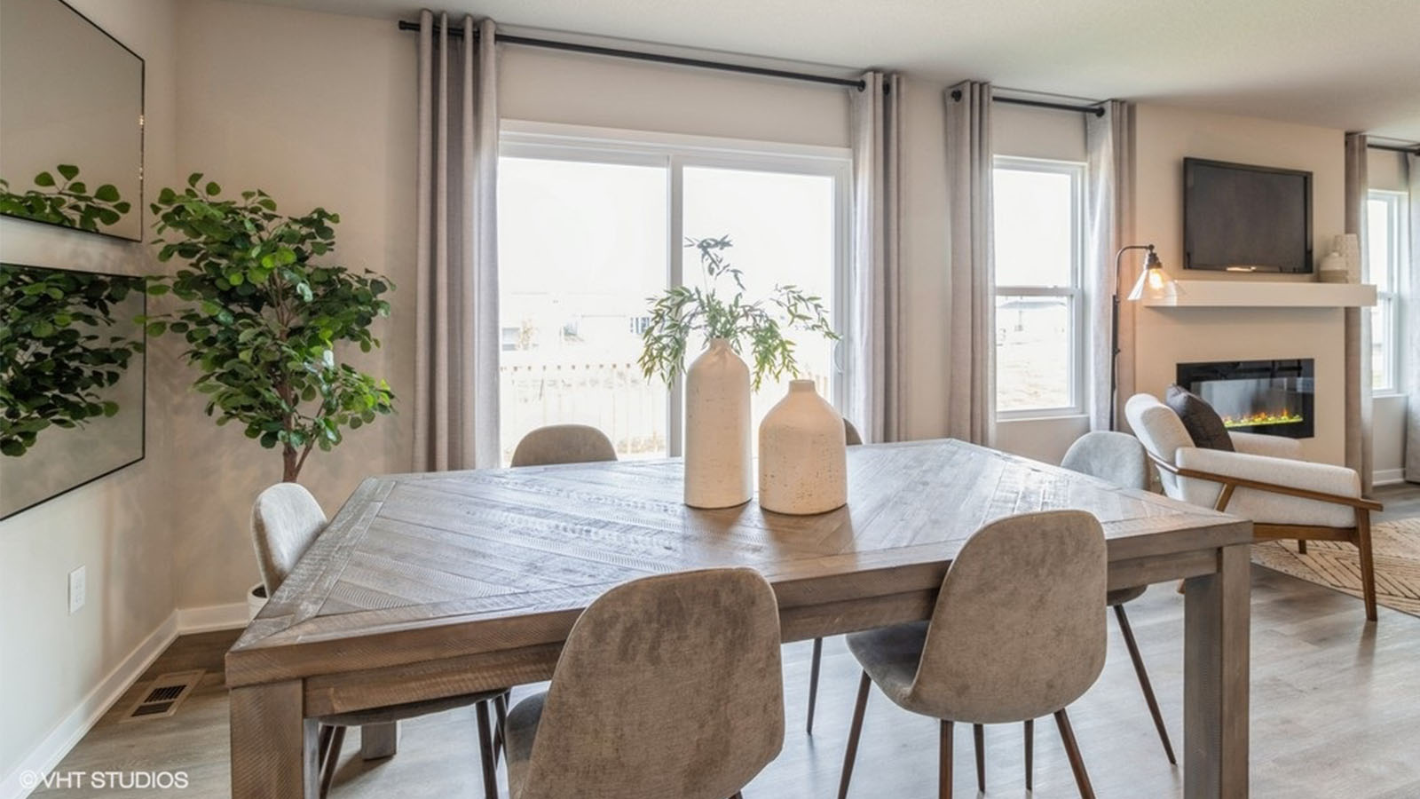 Open concept dining space with access to backyard