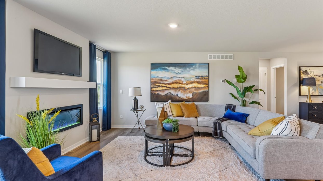 Open concept living room with electric fireplace