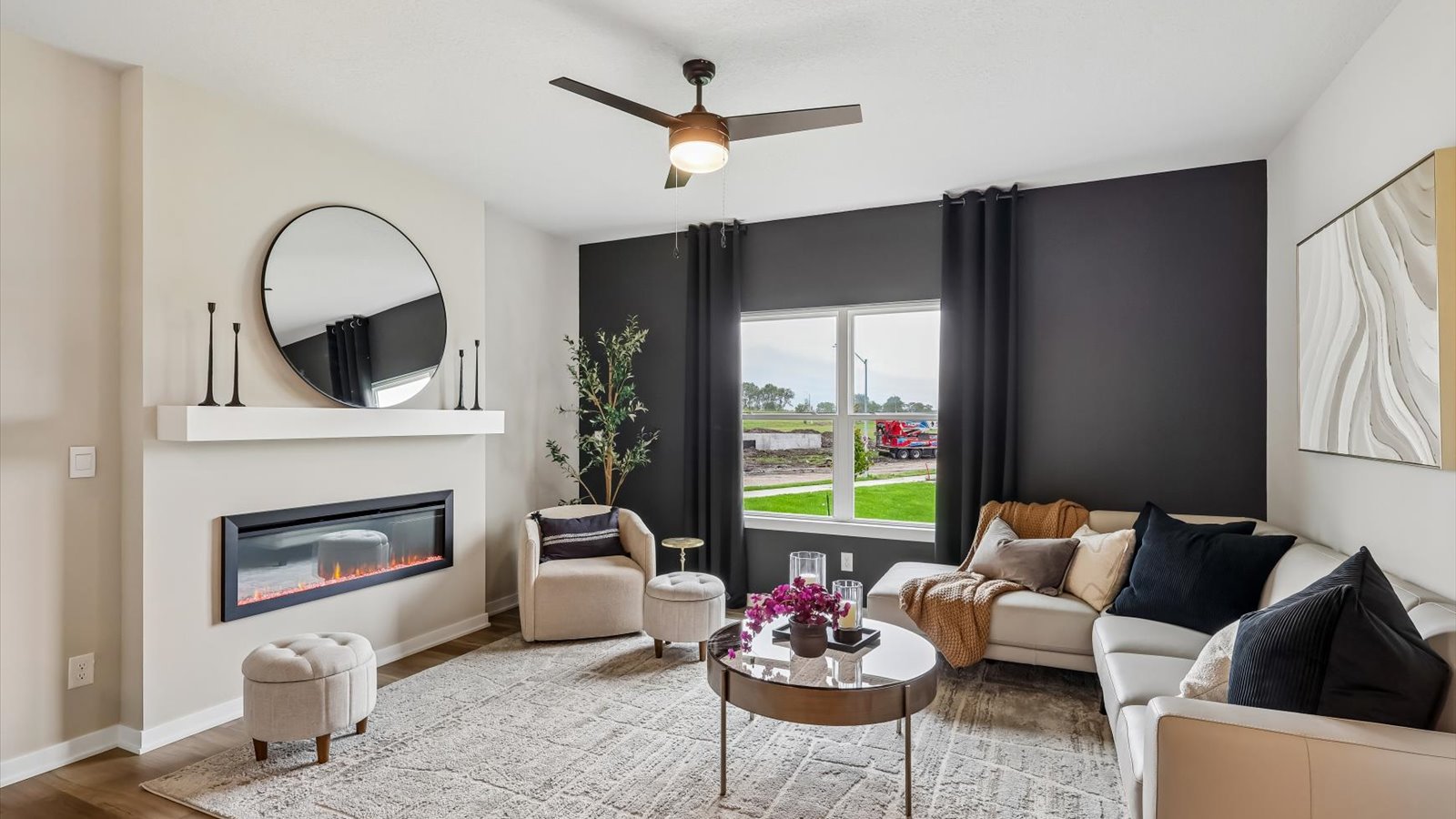 Open concept living room with electric fireplace