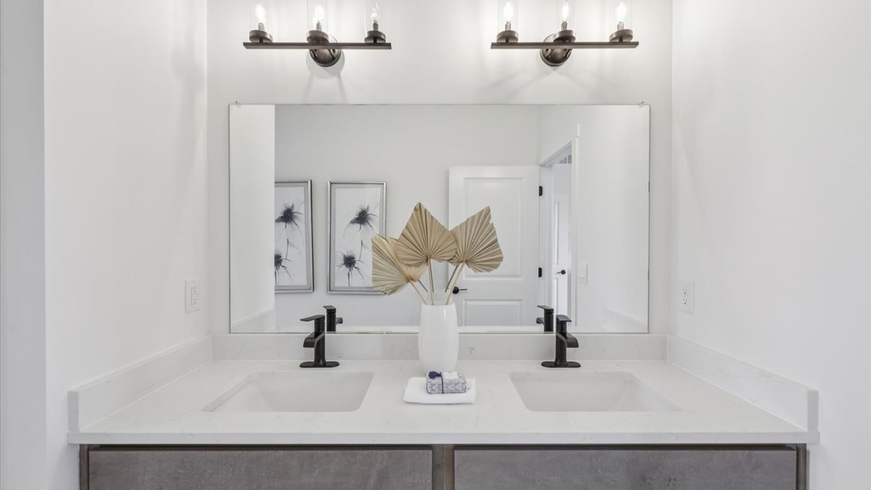 Family full bathroom 2, stylish vanity, mirror, refined fixtures, cabinets, upmarket tub-shower combo