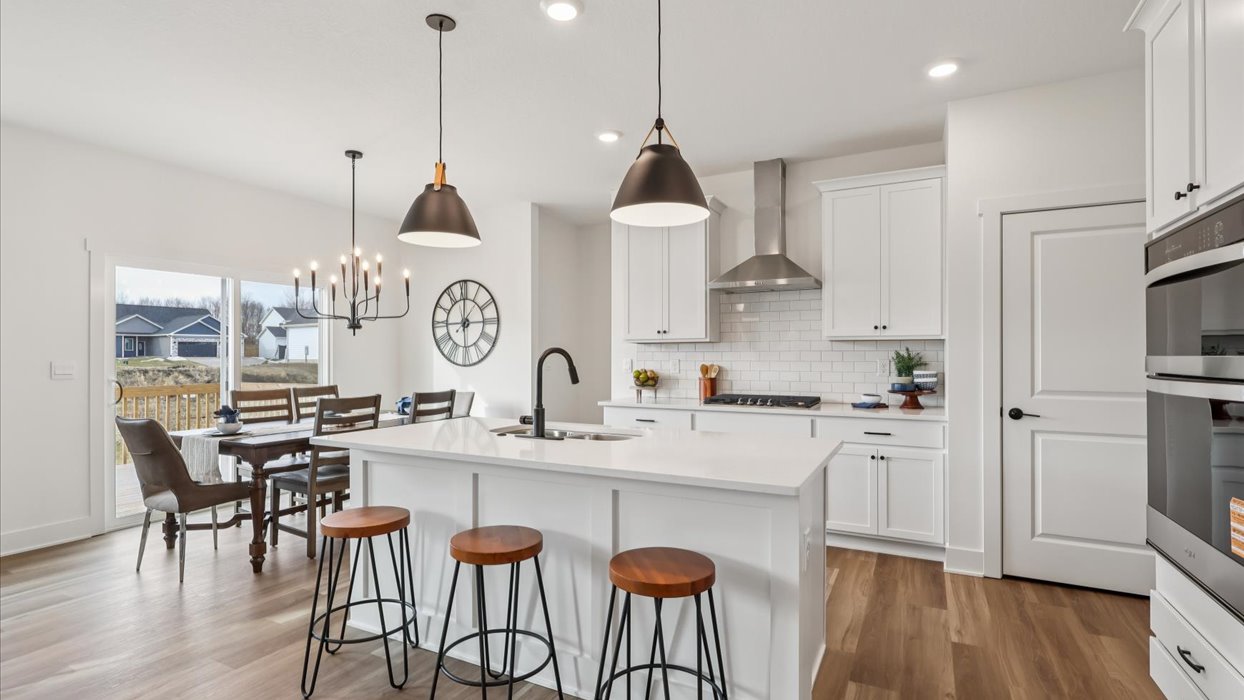 Kitchen, dining, and living areas add relaxed daily flow with open design, smart-home features, new appliance suite included