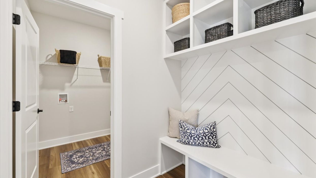 Locker area, mud - snow room add the ultimate drop zone for this new build D.R. Horton residence