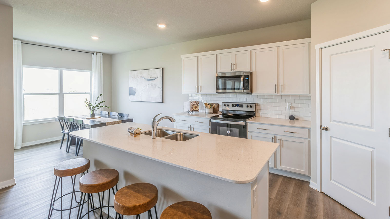 kitchen with island and quartz countertops