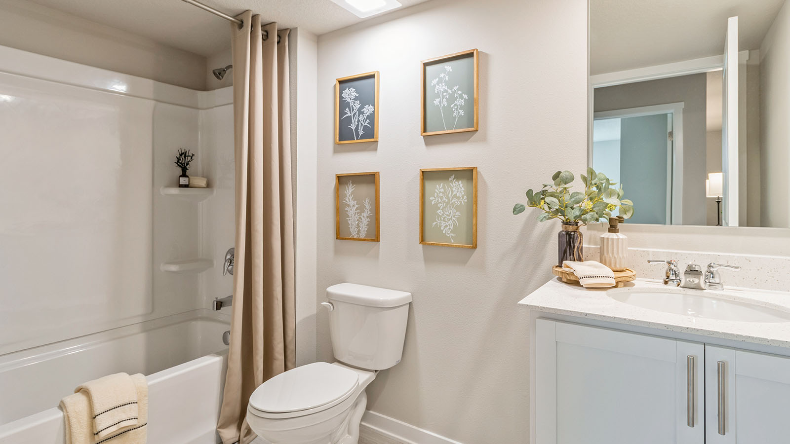 bathroom with shower and bathtub