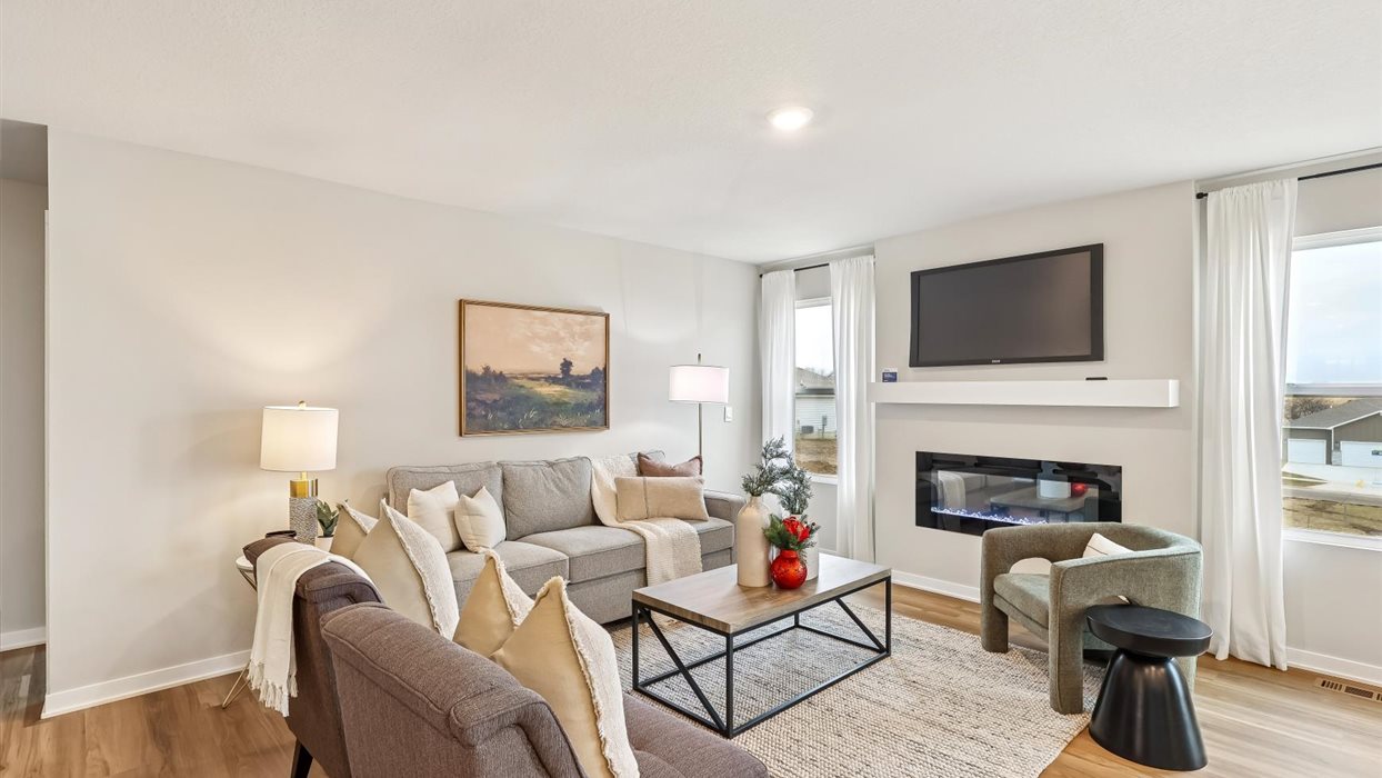 harmony model home with two small windows and electric fireplace