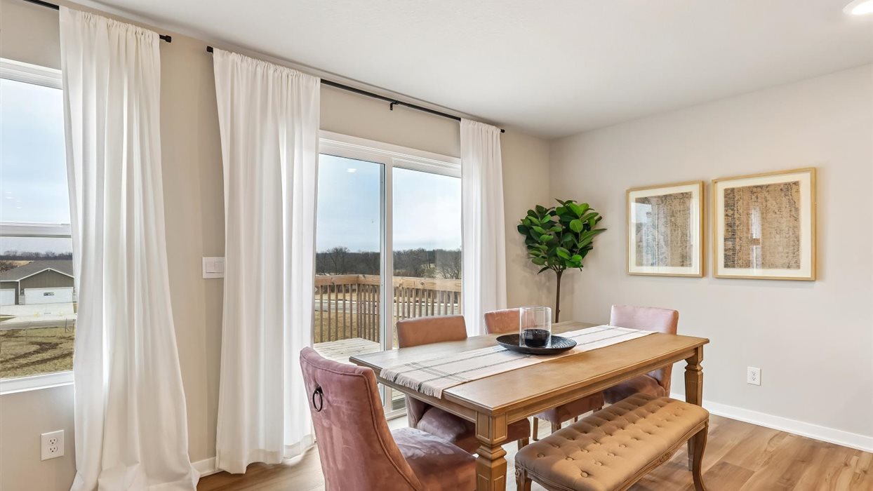 dining area next to sliding glass doors