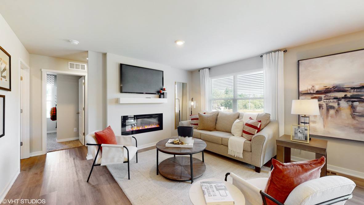 Open concept living room with electric fireplace