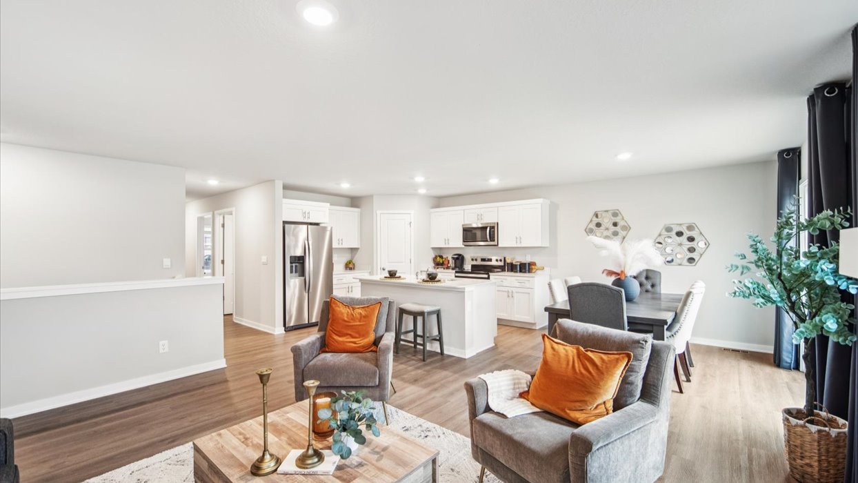 Open concept living room with electric fireplace