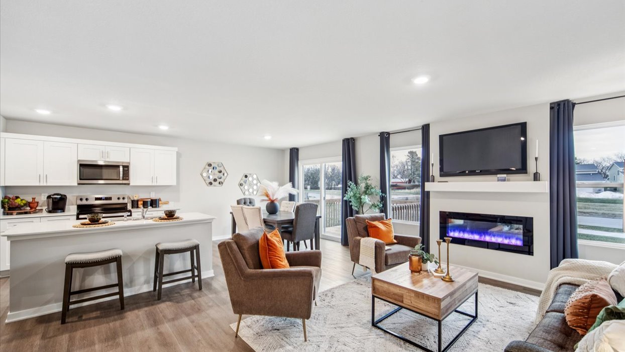 Open concept living room with electric fireplace