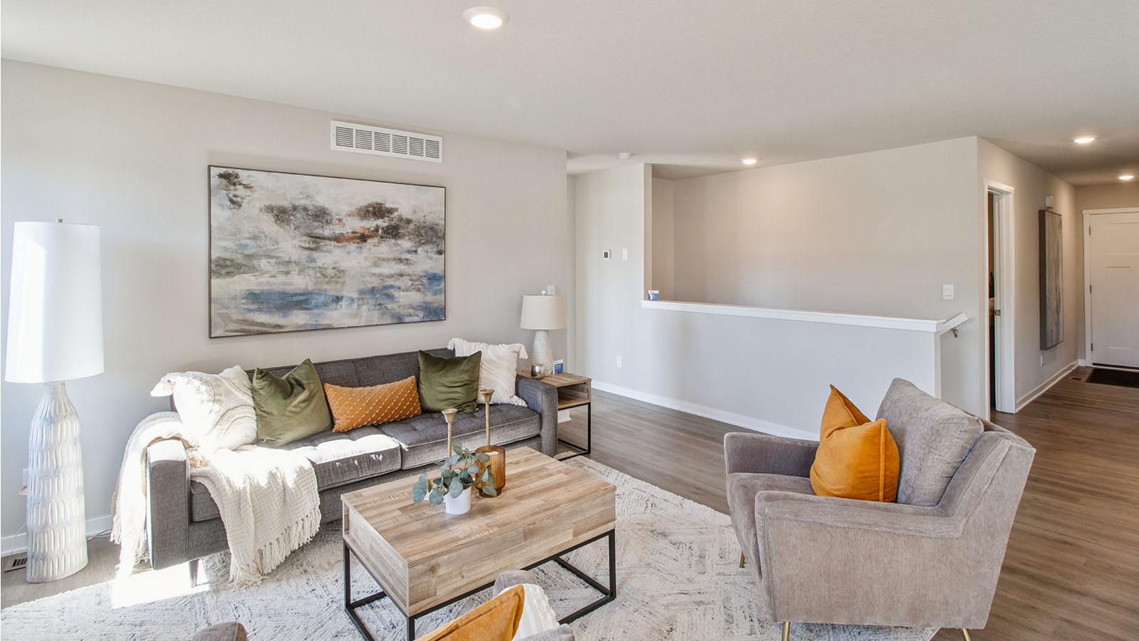Open concept living room with electric fireplace