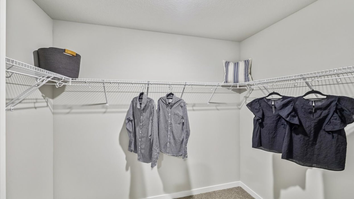 Spacious walk-in closet offering ample room for clothing, accessories, and everyday essentials.
