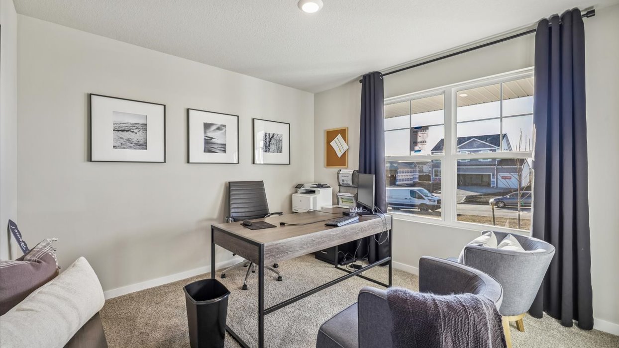 Comfortable secondary bedroom with natural light, modern finishes, and versatile living space.