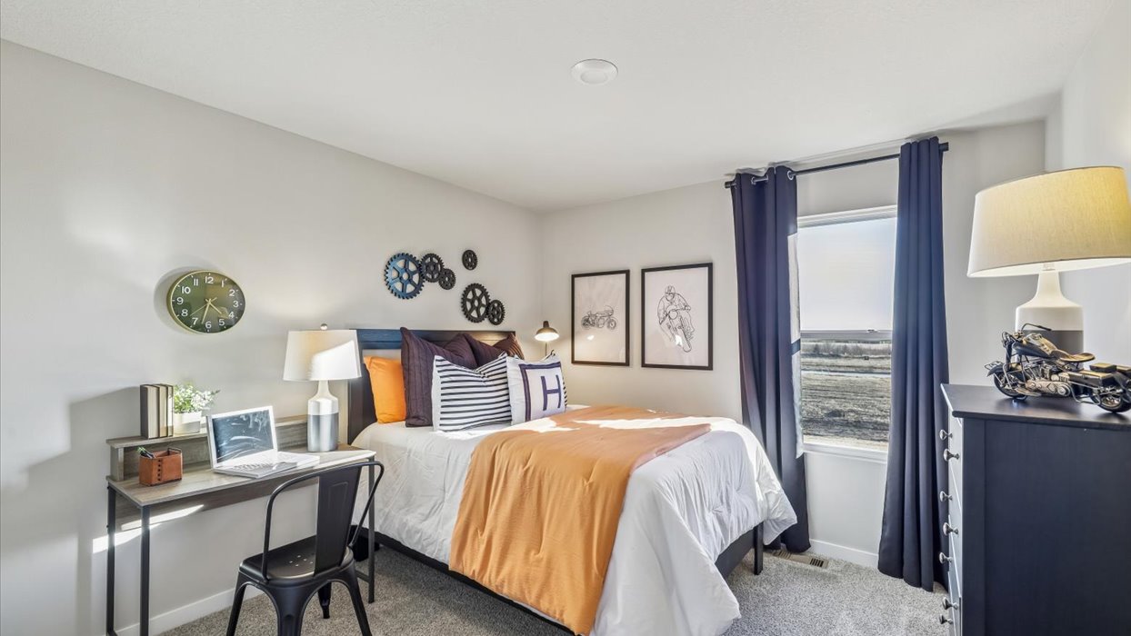 Comfortable secondary bedroom with natural light, modern finishes, and versatile living space.