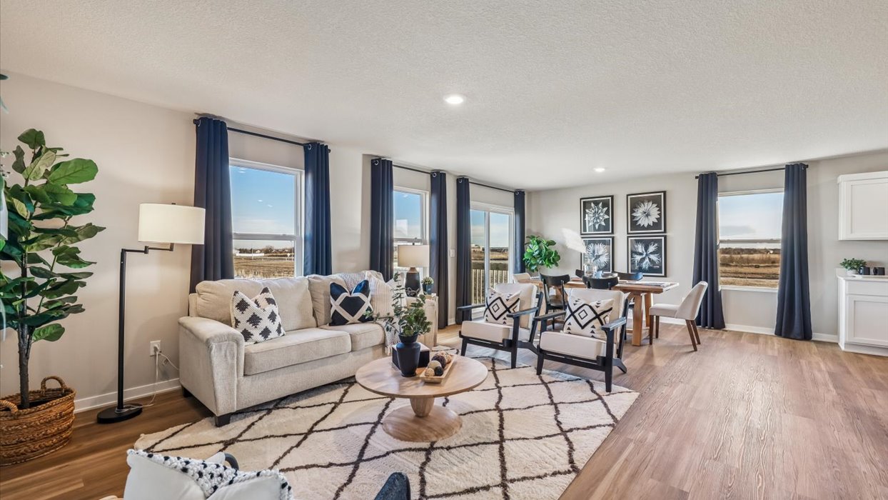 Open concept living room with electric fireplace