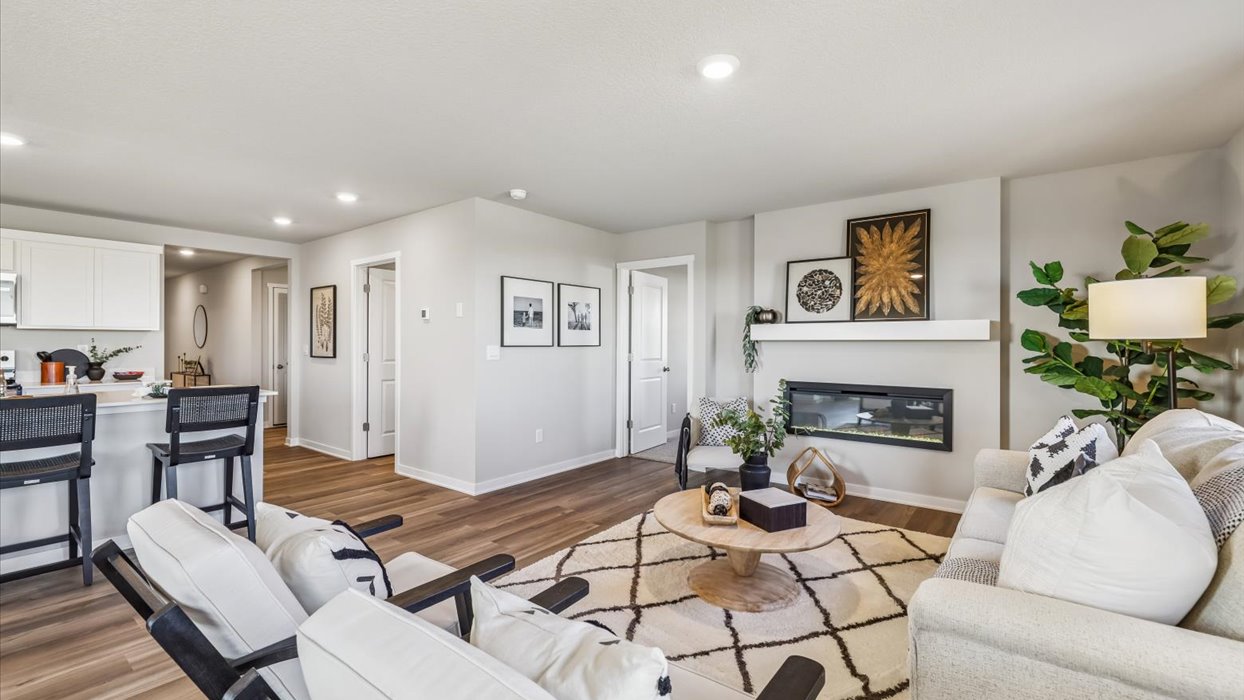 Open concept living room with electric fireplace