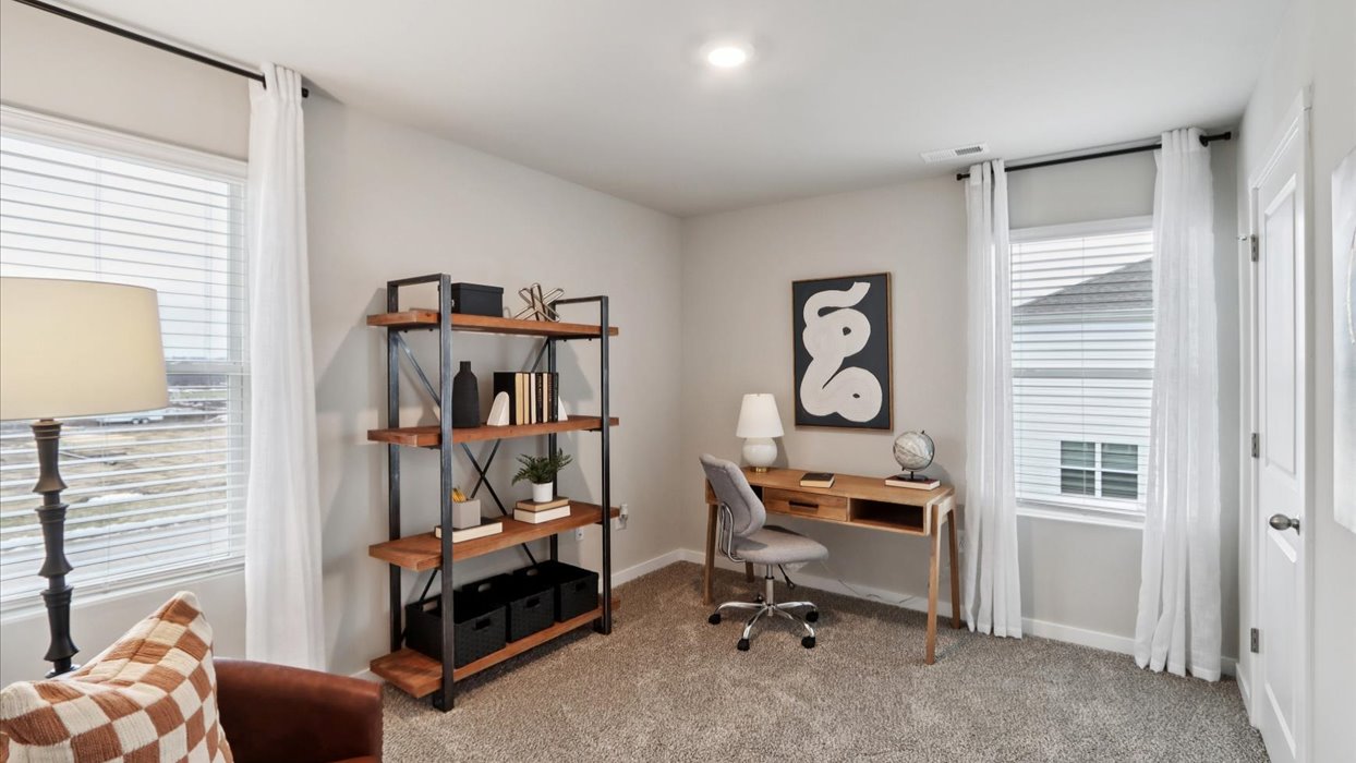 Comfortable secondary bedroom with natural light, modern finishes, and versatile living space.