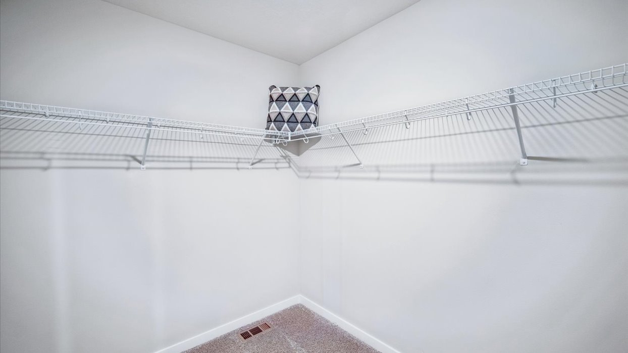 Spacious walk-in closet offering ample room for clothing, accessories, and everyday essentials.