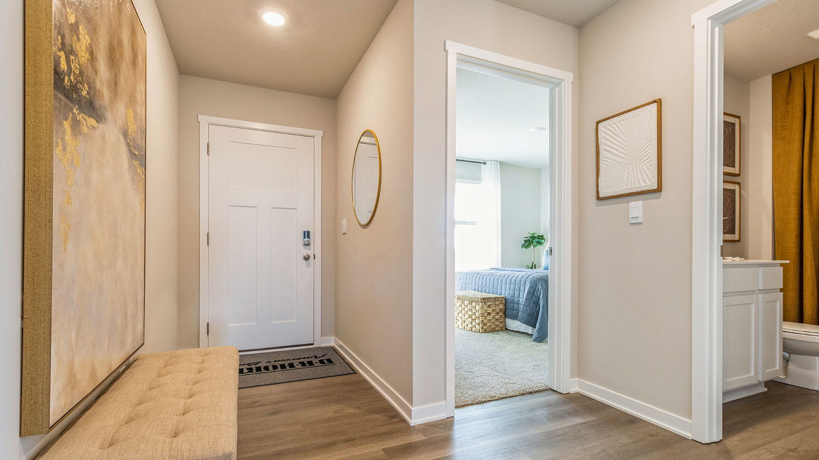 Bright front hallway featuring a welcoming entry space and room for a small table or accents.