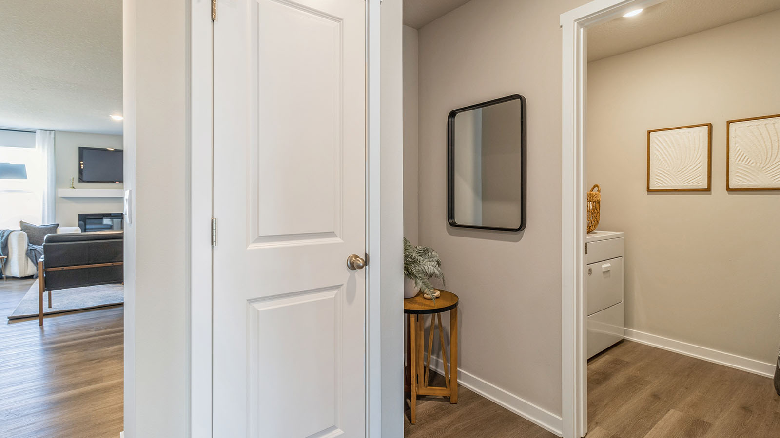Entry space from the garage featuring a convenient coat closet and room for organization.