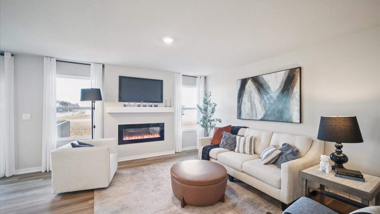 Open concept living room with electric fireplace