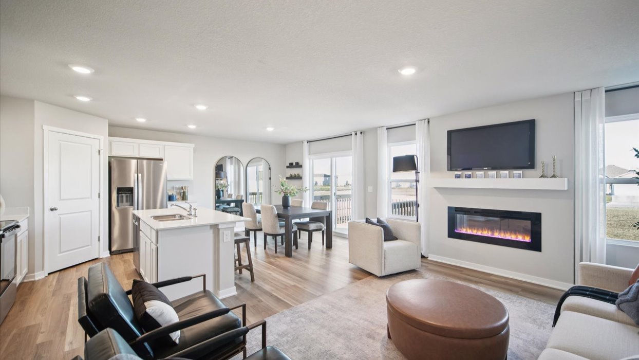 Open concept living room with electric fireplace