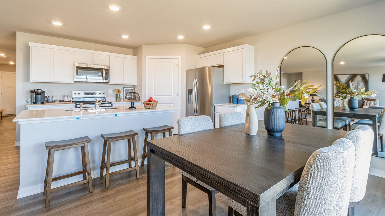 Open concept dining space with access to backyard