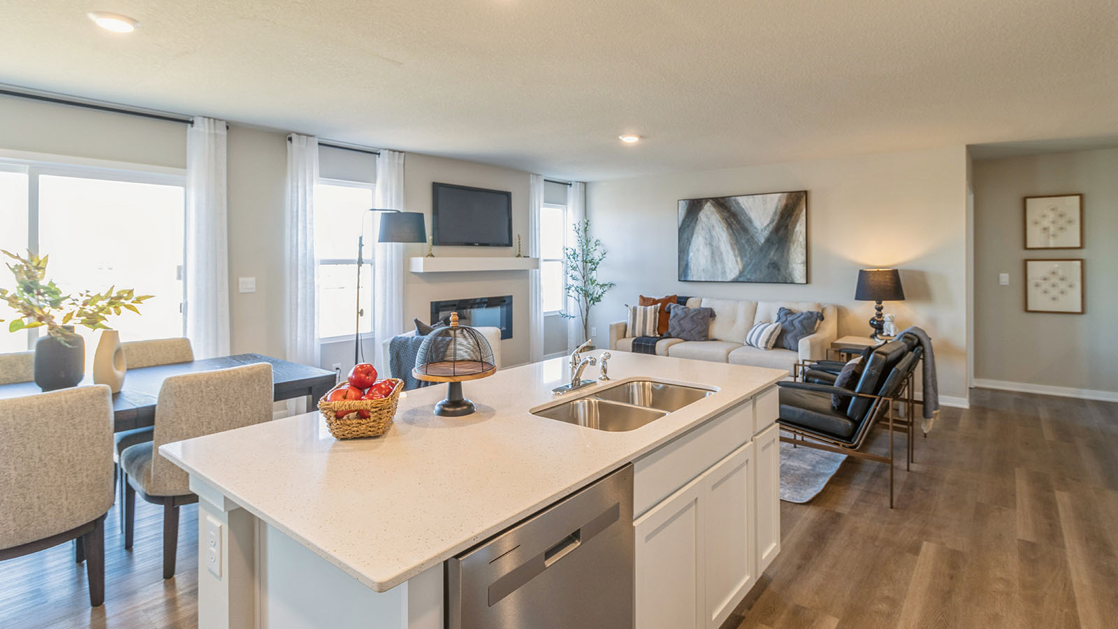 Kitchen with white cabinetry and quartz countertop