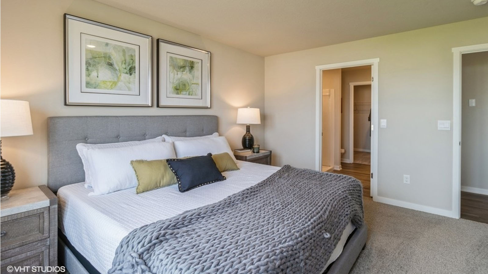 Primary bedroom with natural lighting and spacious layout