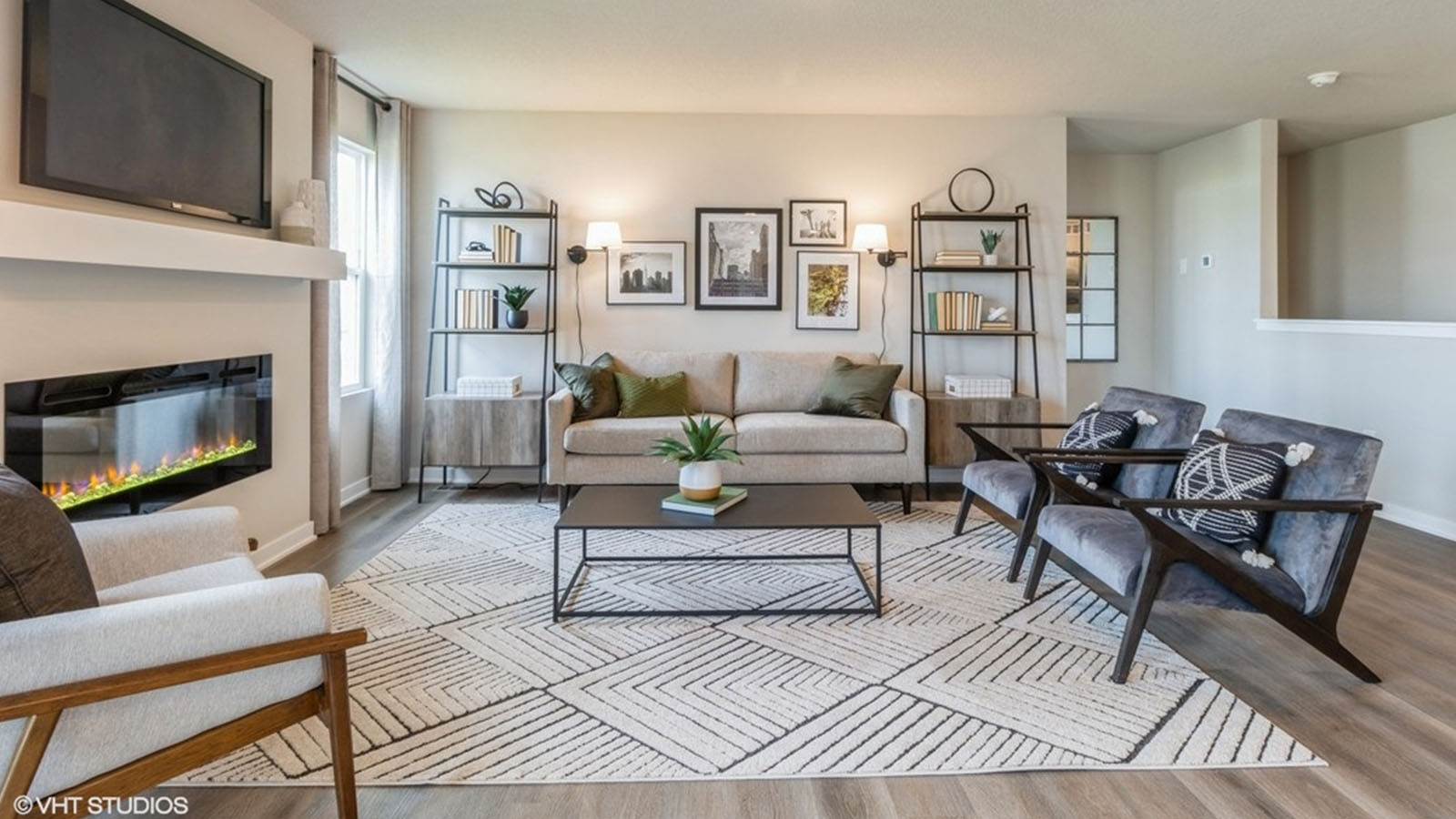 Open concept living room with electric fireplace