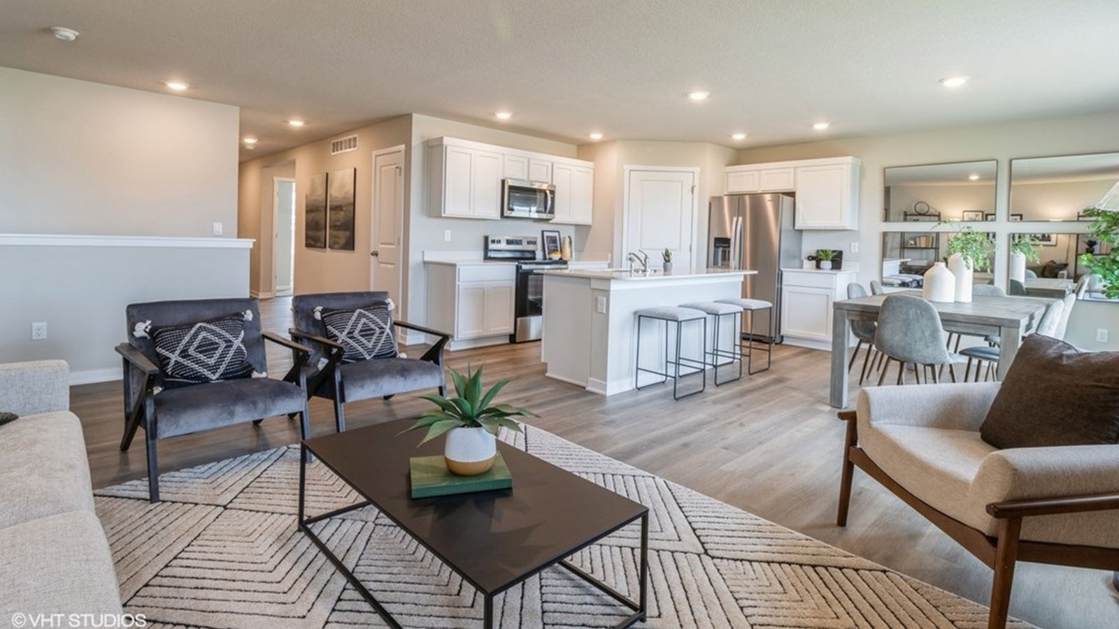 Open concept living room with electric fireplace