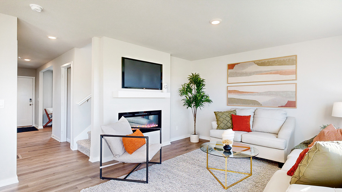 Open concept living room with electric fireplace