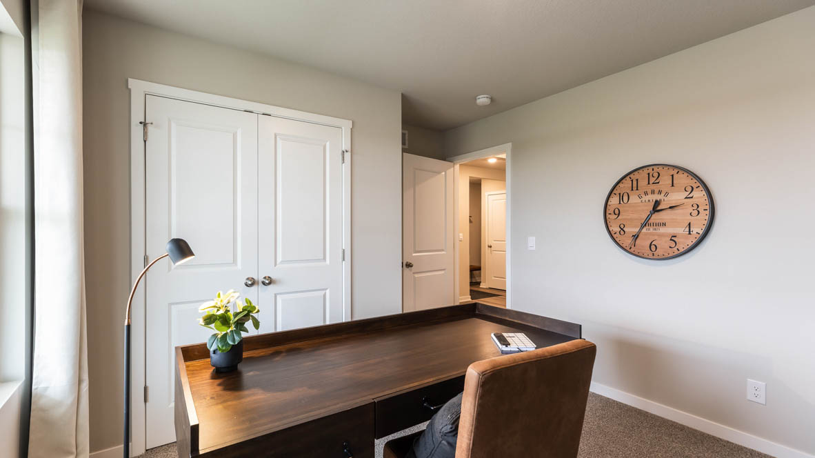 Comfortable secondary bedroom with natural light, modern finishes, and versatile living space.