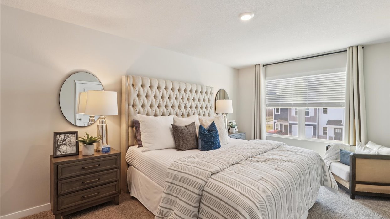 Primary bedroom with natural lighting and spacious layout