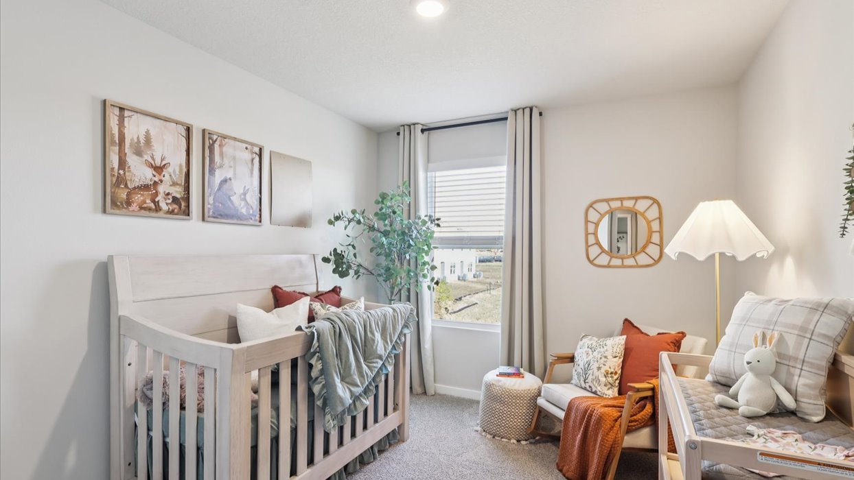 Comfortable secondary bedroom with natural light, modern finishes, and versatile living space.
