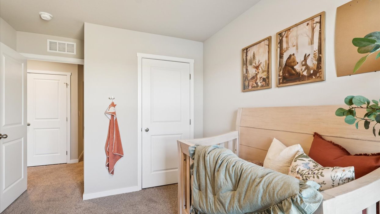 Comfortable secondary bedroom with natural light, modern finishes, and versatile living space.