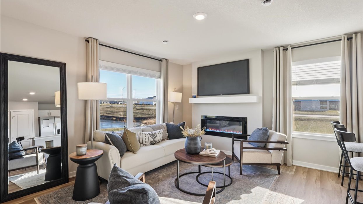 Open concept living room with electric fireplace