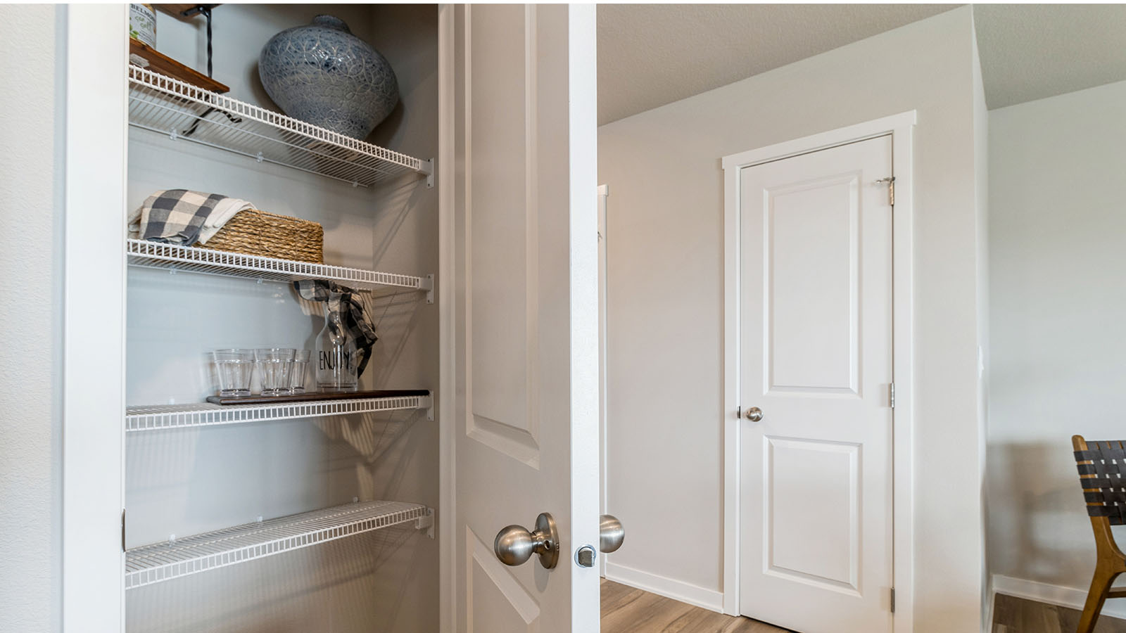 Kitchen with white cabinetry and quartz countertop