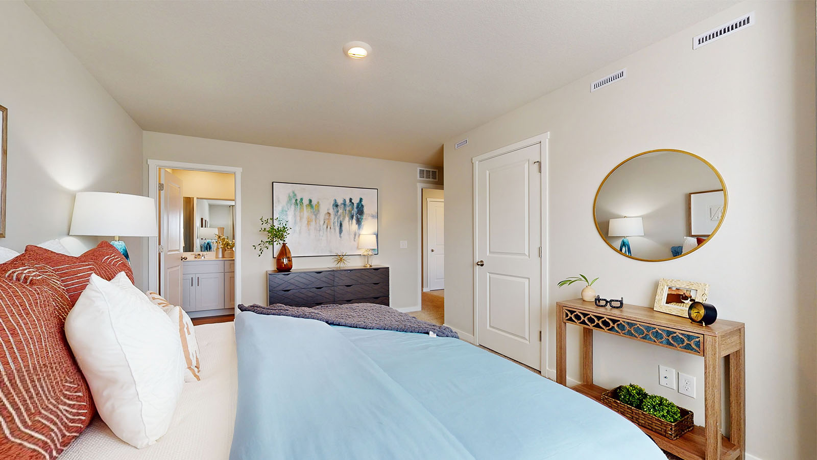Primary bedroom with natural lighting and spacious layout