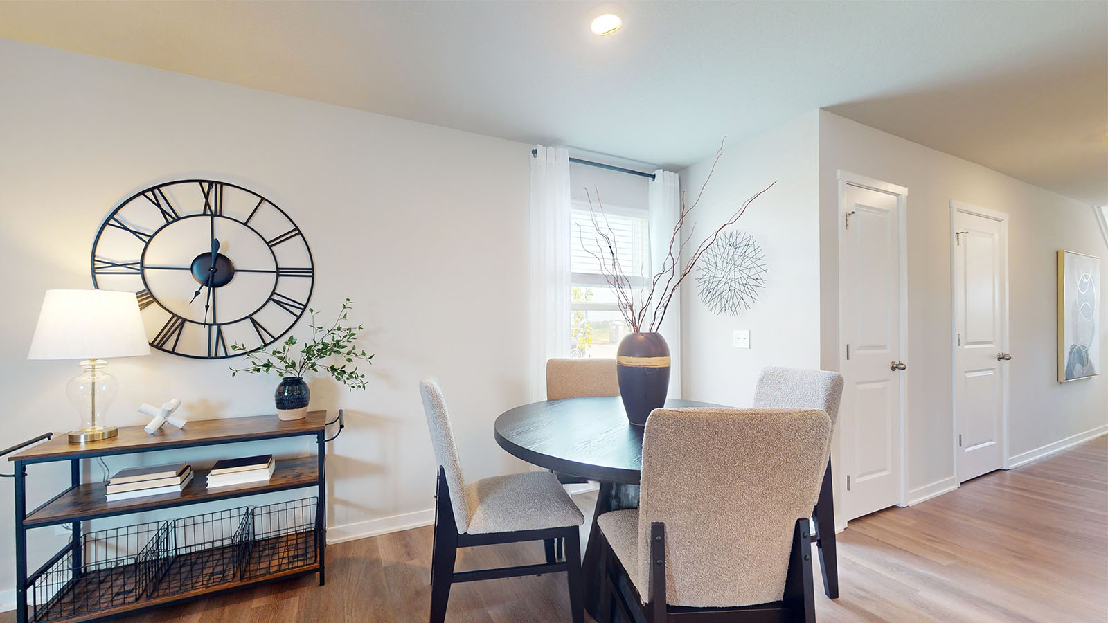Open concept dining space with access to backyard