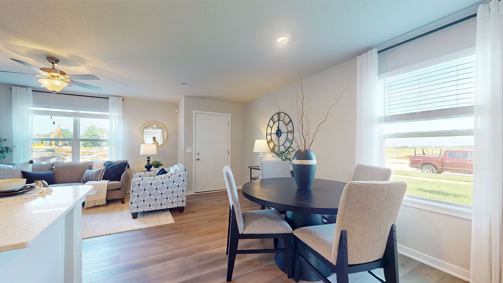 Open concept dining space with access to backyard