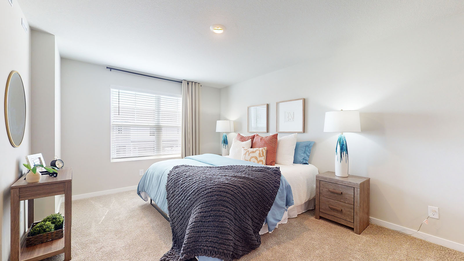 Primary bedroom with natural lighting and spacious layout