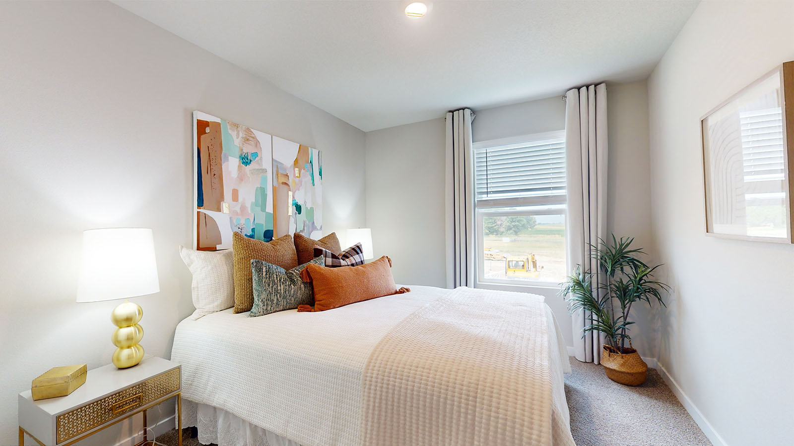 Comfortable secondary bedroom with natural light, modern finishes, and versatile living space.