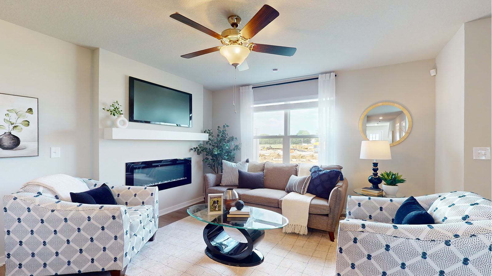 Open concept living room with electric fireplace