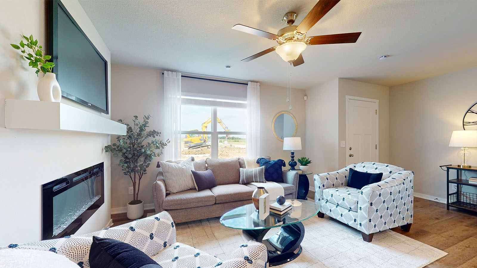 Open concept living room with electric fireplace