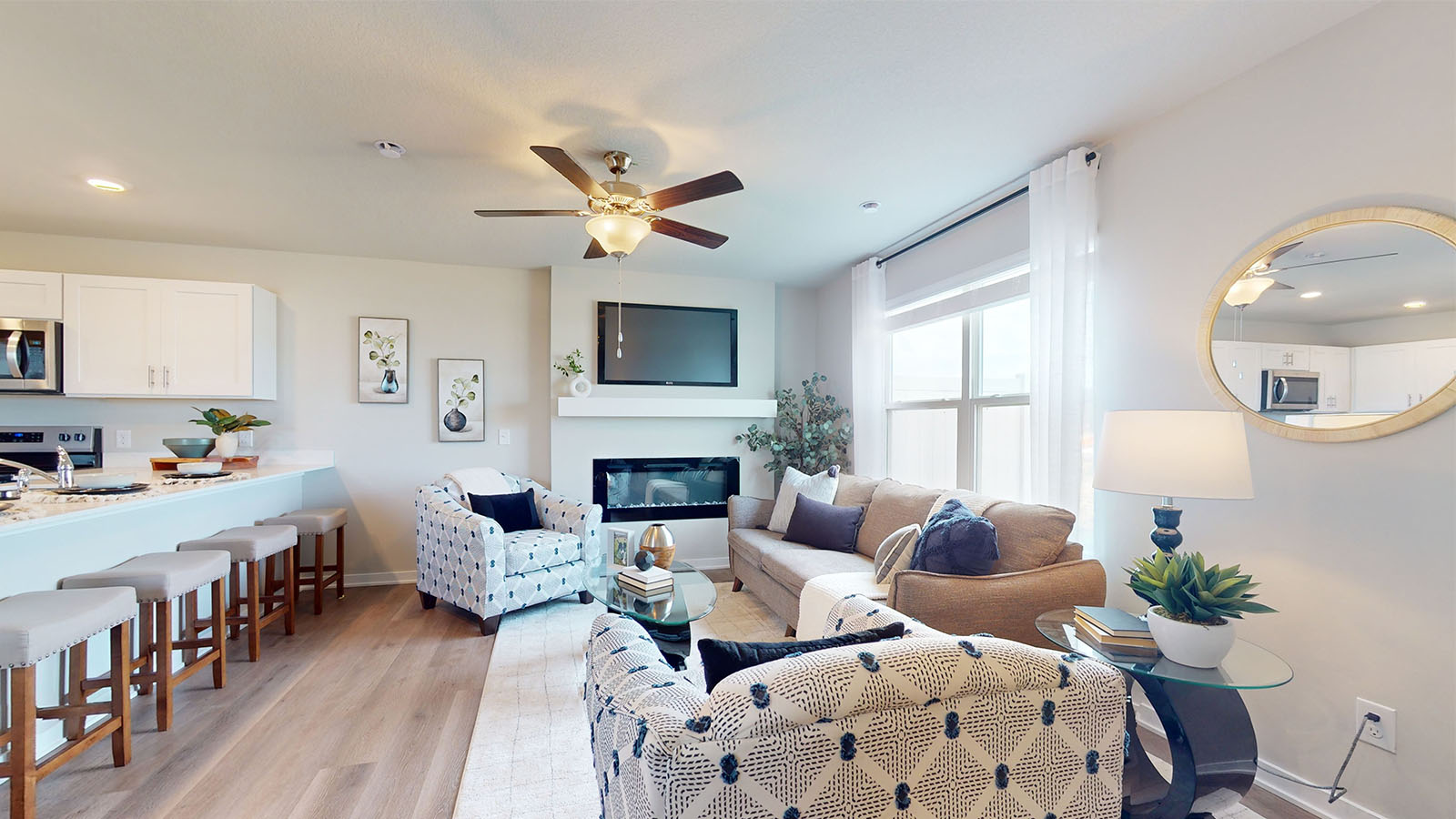 Open concept living room with electric fireplace