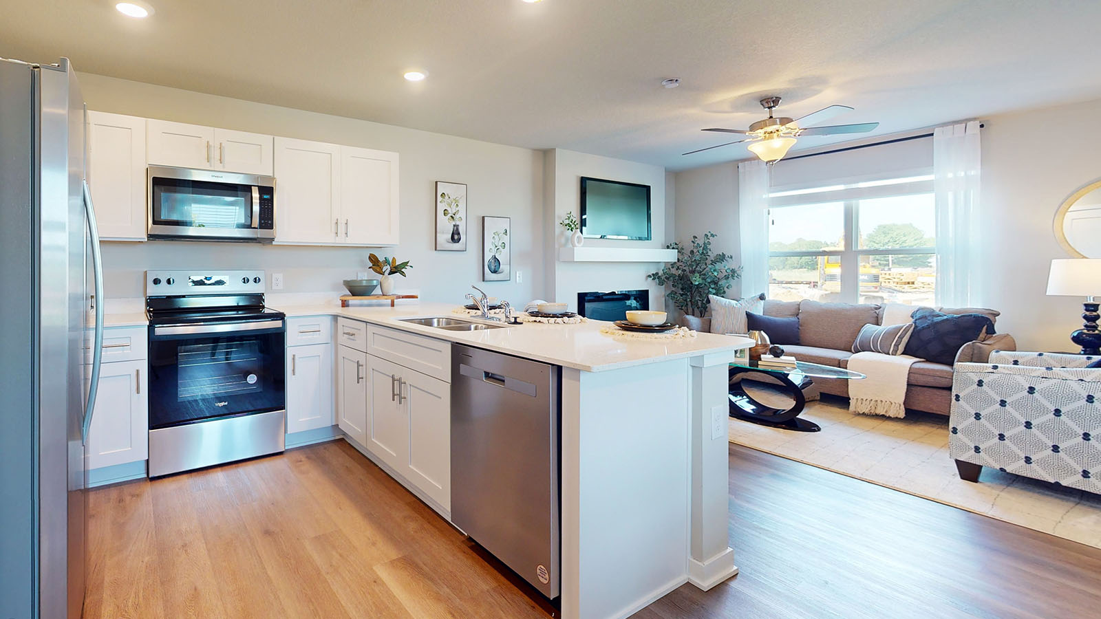 Kitchen with white cabinetry and quartz countertop