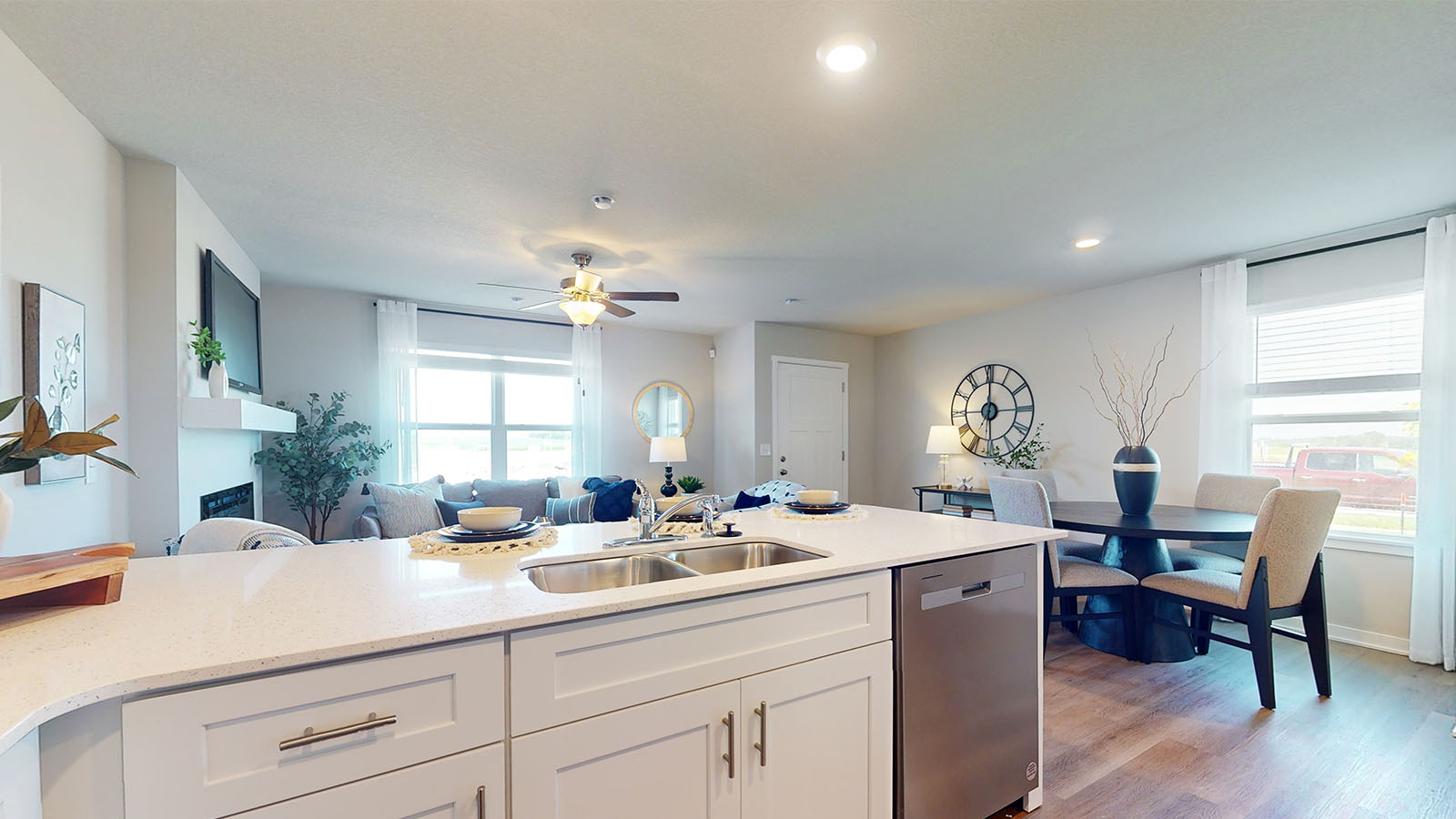 Kitchen with white cabinetry and quartz countertop