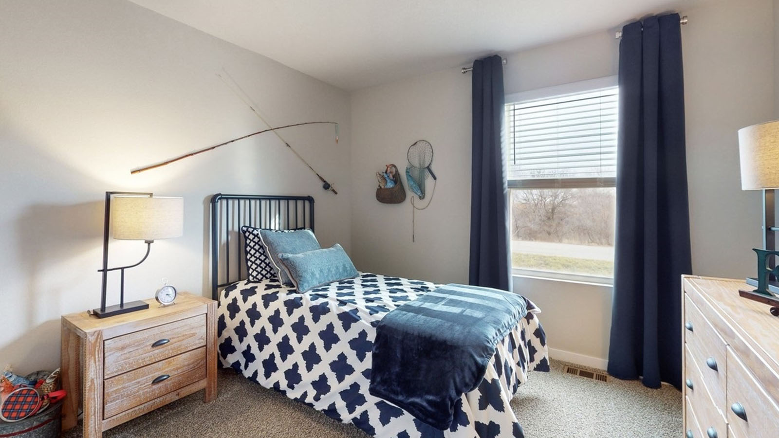 Comfortable secondary bedroom with natural light, modern finishes, and versatile living space.