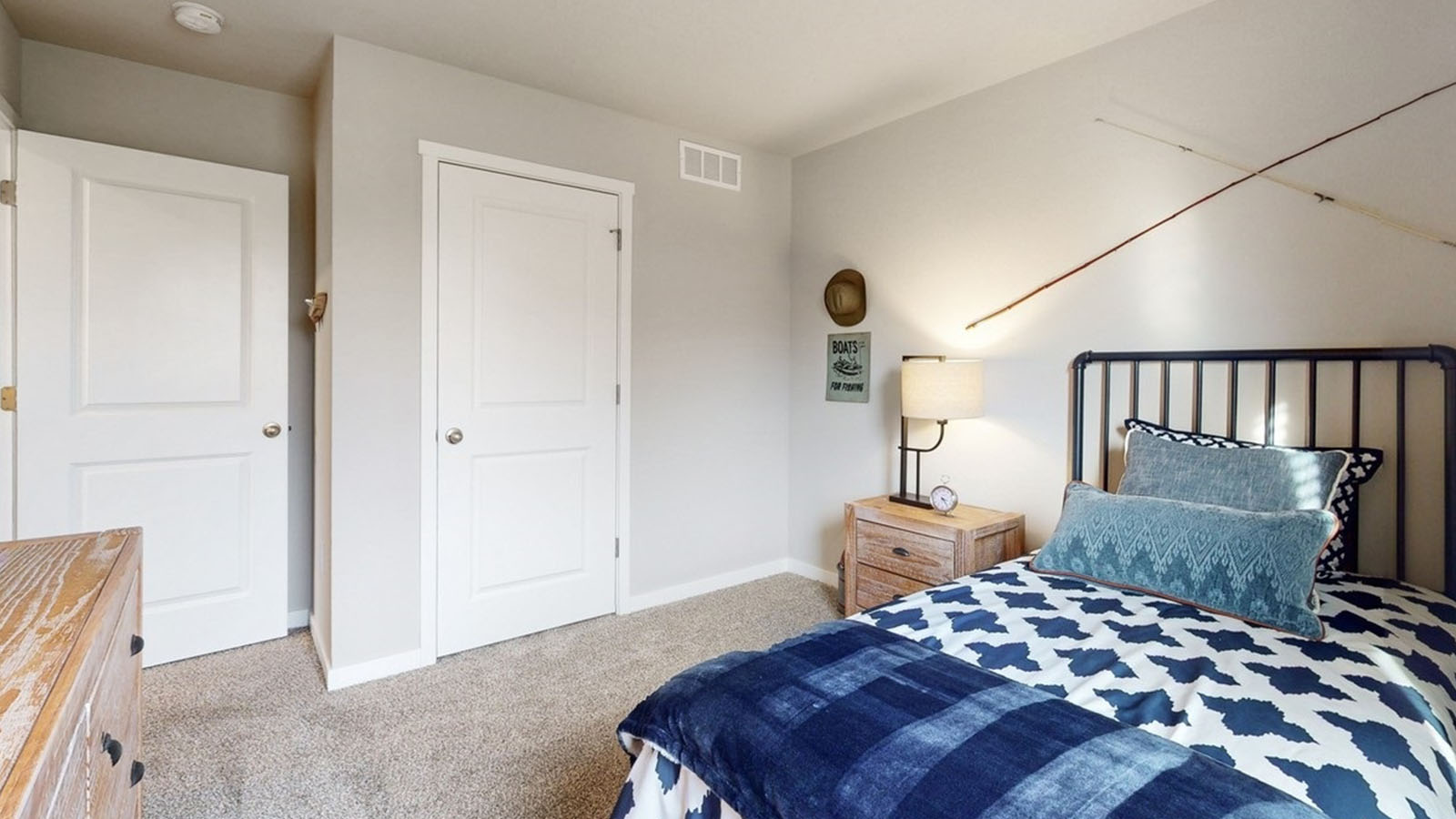 Comfortable secondary bedroom with natural light, modern finishes, and versatile living space.