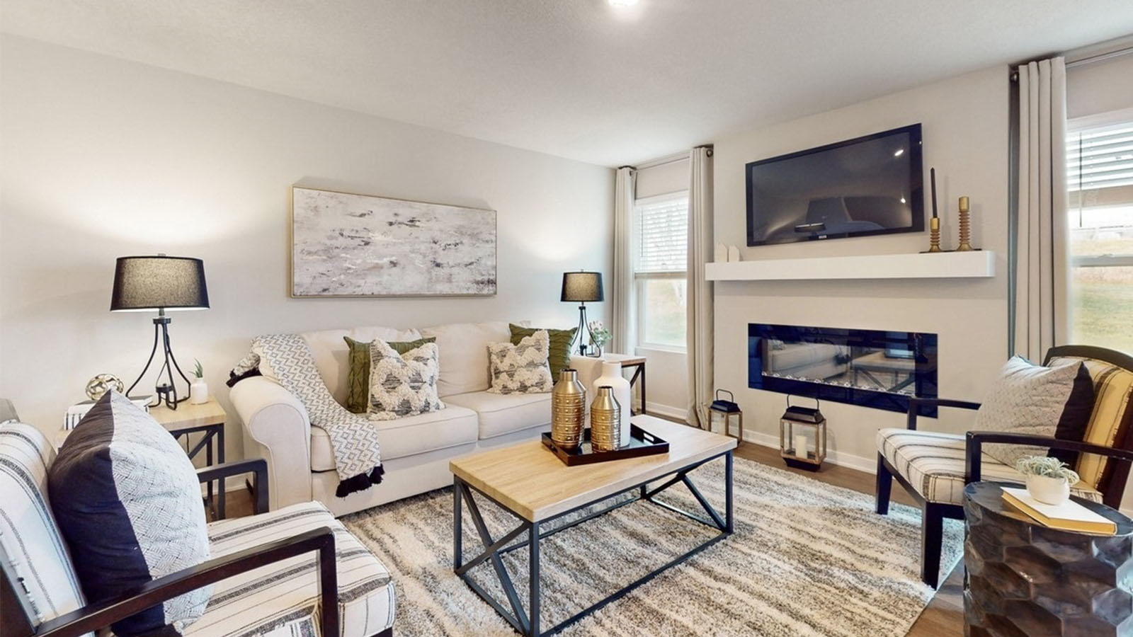 Open concept living room with electric fireplace